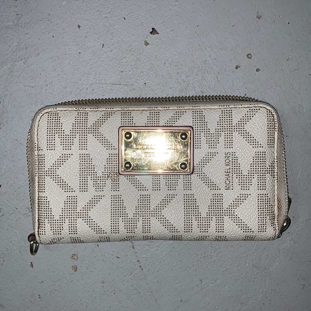 White wallet by Michael Kors